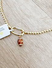 Load image into Gallery viewer, Kendra Scott Football Gold Metal Strand Necklace in White CZ